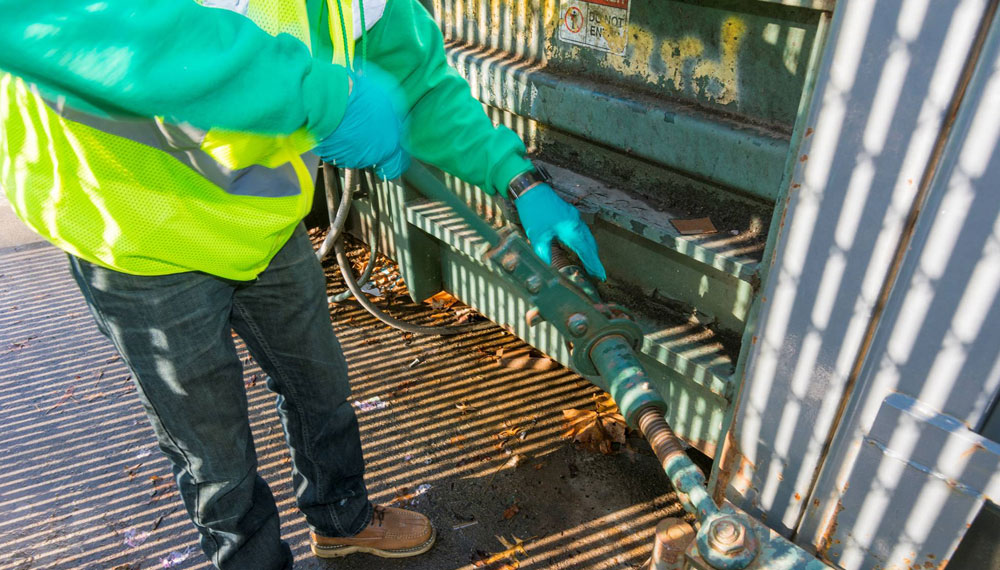 Compactor Cleaning slide image